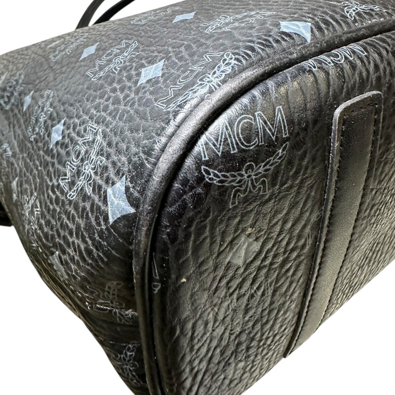 MCM Liz Reversible Black Logo Tote with Pouch<br />
<br />
Dimensions:14 H X 11 L inches<br />
<br />
In good condition. Wear on the leather straps, corner wear  and interior marks.<br />
<br />
Does not come wit original dust bag or box.