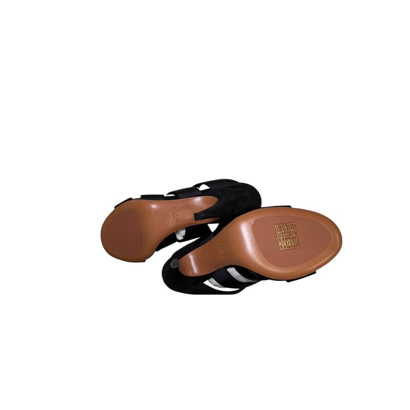 Alaia Elastic Black Mules<br />
<br />
Size 38<br />
<br />
In excellent condition. Like new<br />
<br />
Comes with original dust bag. No box